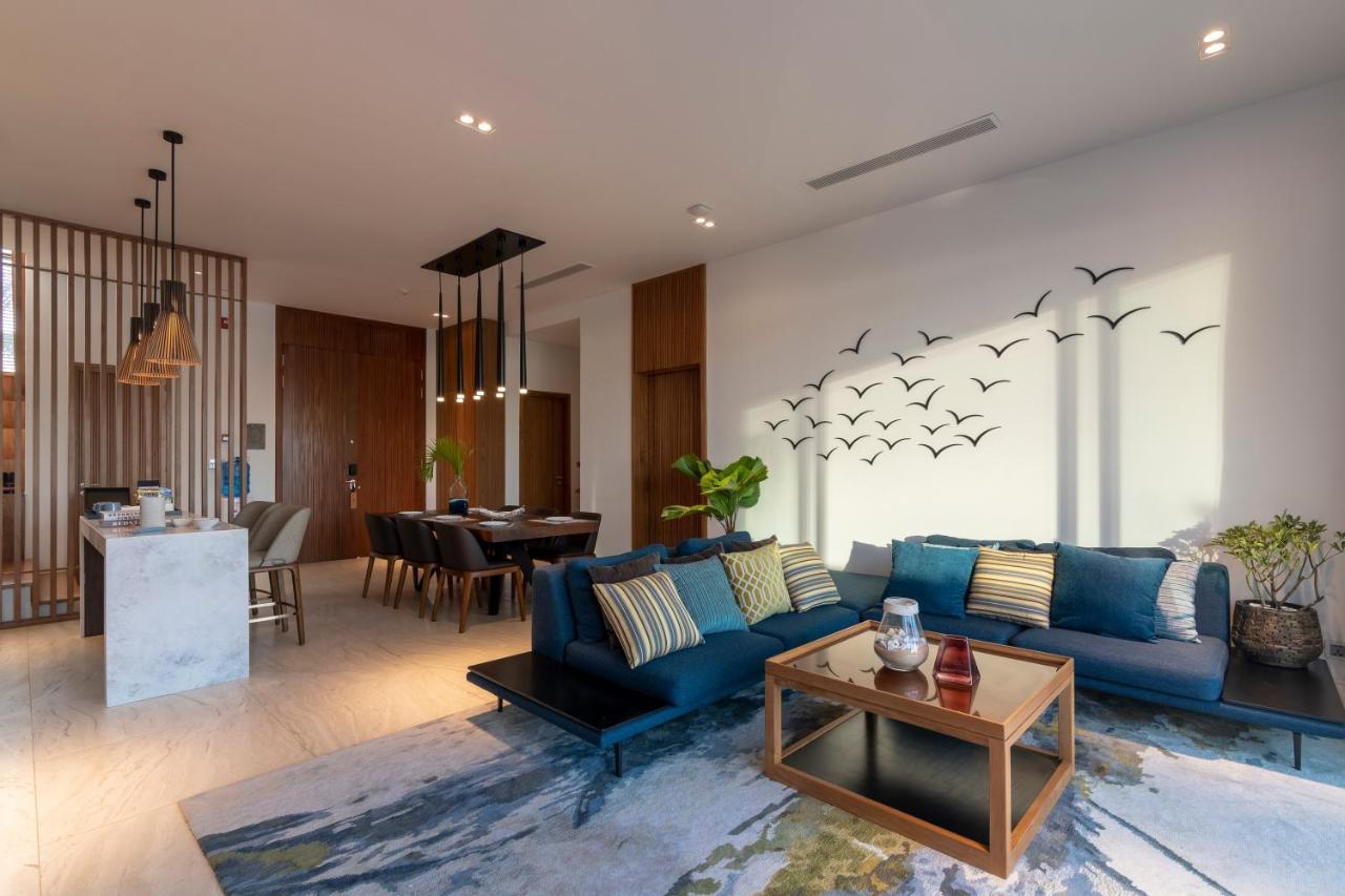 Moevenpick Villas & Residences Phú Quốc-sziget Kültér fotó A living room in a condominium