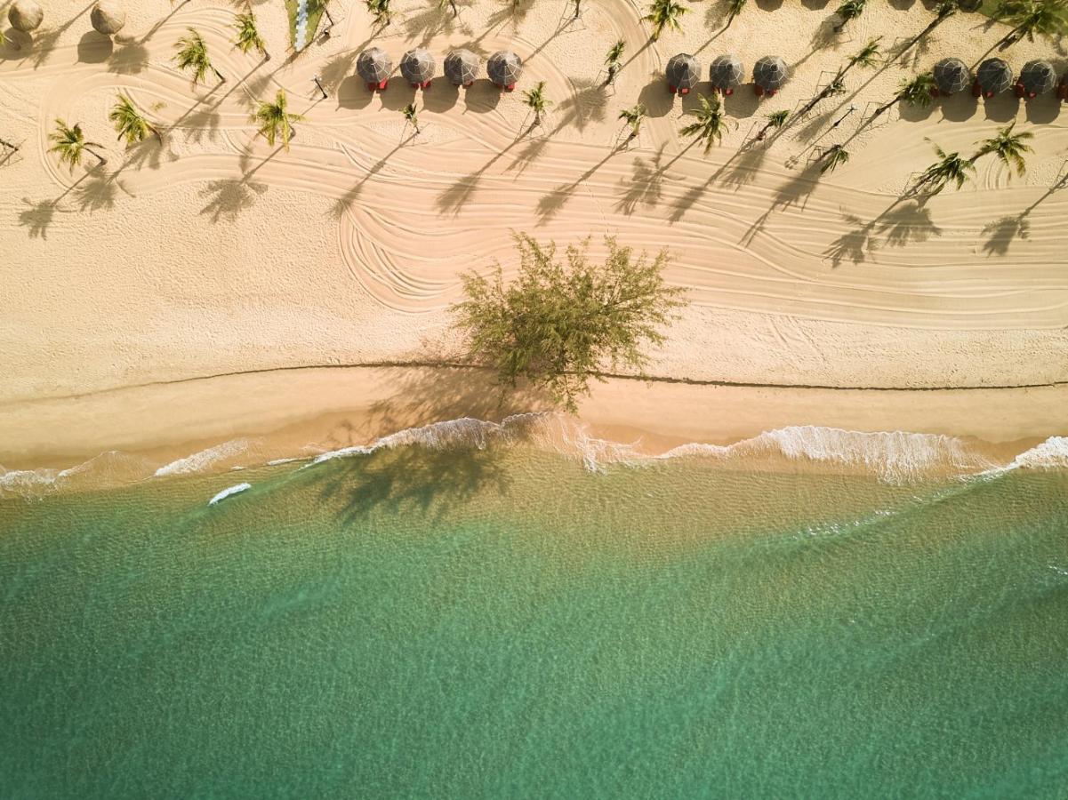 Moevenpick Villas & Residences Phú Quốc-sziget Kültér fotó Aerial view of the beach